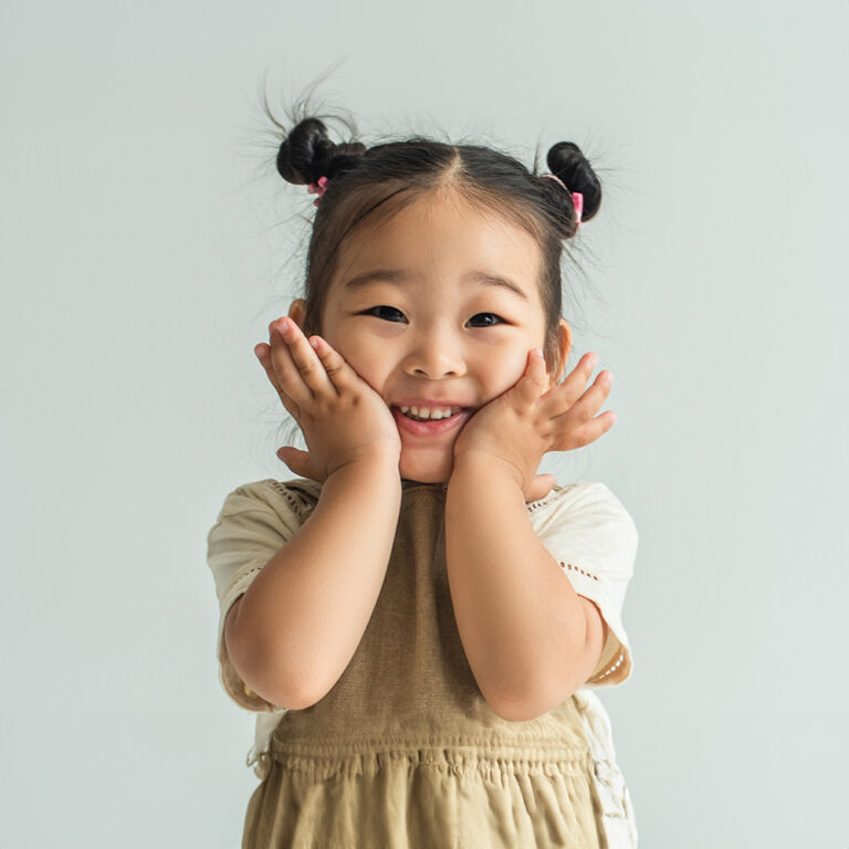 Happy smiling child after receiving child therapy.